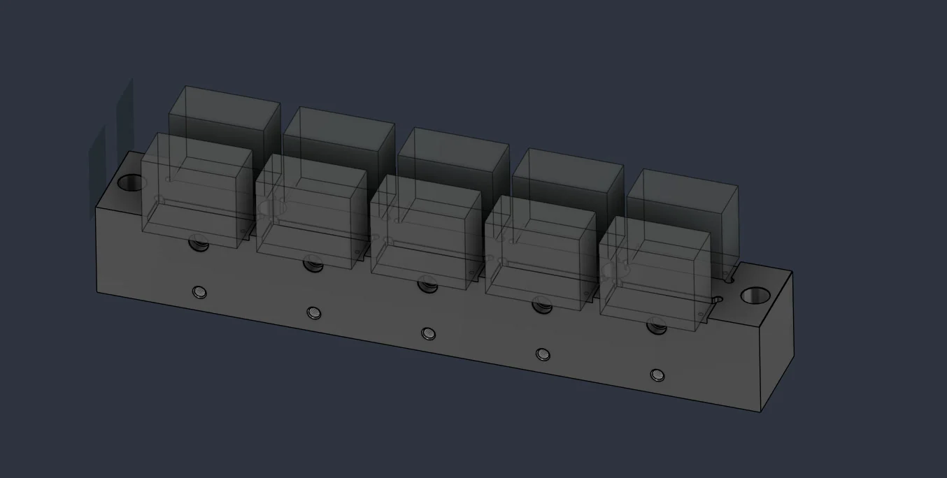 Five workpiece positions on a fixture model in Autodesk Fusion