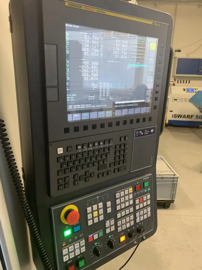 FANUC i Series control panel on a Doosan machining center