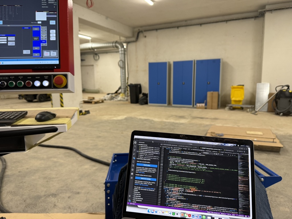 Programming and debugging the Fanuc postprocessor for the Houfek CNC machine right at the control panel on the shop floor